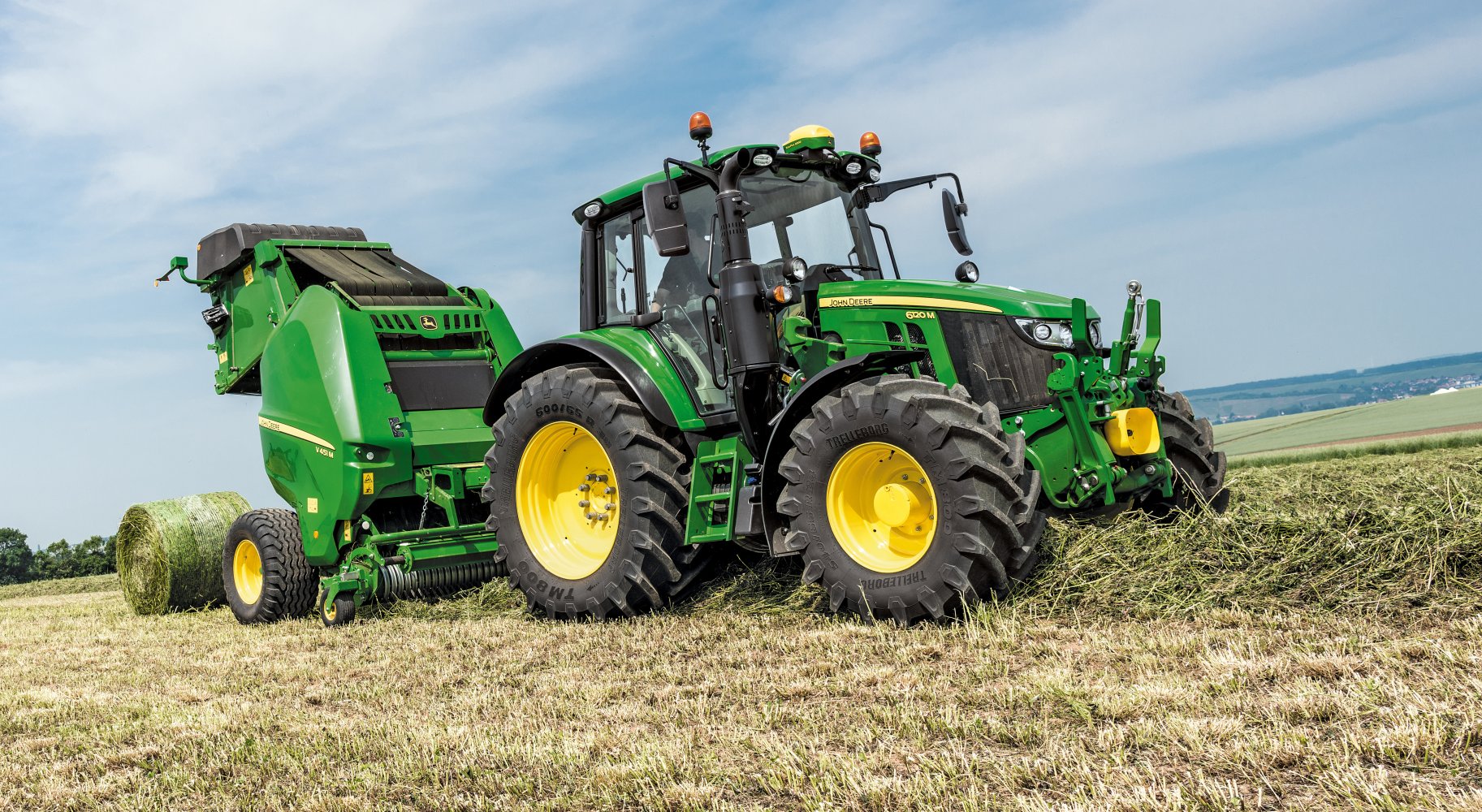 Traktor av typen John Deere 6120M AutoPowr.